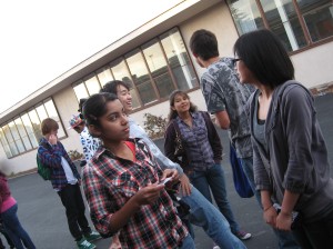 Students talk to their friends while they wait for the PSAT to start.
